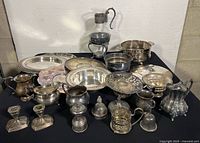 All items arranged showing variety of silver-plated pieces