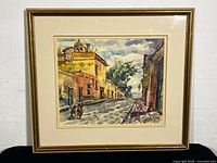 Frontal view of framed watercolour painting in frame