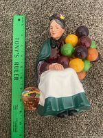 Front view with ruler showing height around 7.5 inches