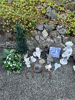 Full lot with statues, faux plants, horseshoes