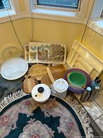 Group shot shows cutting boards, placemats, bowls, salad spinner, water bottles, drawer organizer