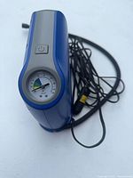 Top view showing analog pressure gauge marked to 150 psi and power button