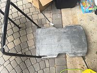 Top view showing gray platform and folded black handle