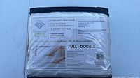 Front of zippered package showing Diamond Hotel branding and contents list
