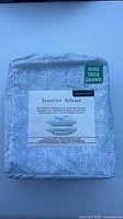 Front of packaged Jennifer Adams sheet set showing brand, size and pattern