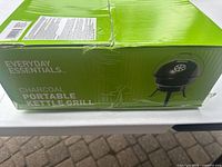 Sealed green retail box showing Everyday Essentials branding and product image