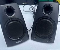 Front view of both Logitech Z130 speakers
