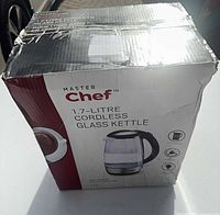 Outer packaging displaying Master Chef 1.7-L cordless glass kettle