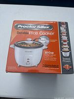 Front of sealed Proctor Silex rice cooker retail box
