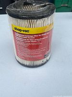 Front view of sealed Shop-Vac 90328 cartridge filter showing product label
