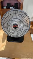 Full view of Presto parabolic heater on tabletop