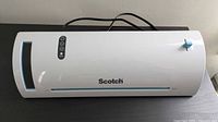 Full view of Scotch TL902 white laminator with power cord