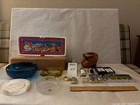 Overall lot layout showing all Camel collectibles and ashtrays