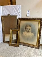 All three gold-tone frames standing together
