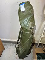 Full view of closed green golf bag