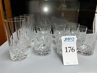 Group of 16 cut crystal glasses, short and tall