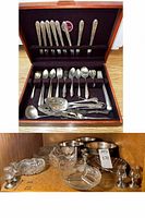 Flatware set in wood case on upper half, various crystal, silver plate and sterling pieces on lower shelf