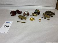 All ten miniature animal figures displayed together