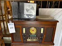 Victrola stereo with Midland radio stacked on top