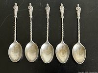 All five Apostle spoons laid out