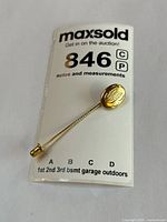 Stick pin in labelled pouch showing full view