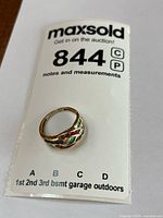 Ring with auction tag showing overall look