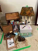 Group shot of entire lot showing lamp, writing box, prints, figurines, storage boxes
