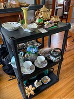 Overview of all items on three-tier shelf