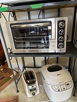 KitchenAid countertop oven, Oster bread maker below