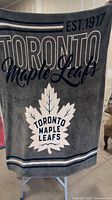 Full view of Toronto Maple Leafs blanket showing logo and text