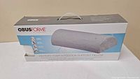 Front of boxed ObusForme Memory Foam 4 Position Support Pillow