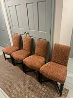 Front view of the four Donghia dining chairs