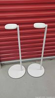 Full view of both white Sonos speaker stands