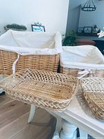 Overview of four wicker baskets showing relative sizes and liners