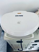 Closed view showing George Foreman branding and exterior condition