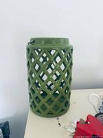 Front view of green ceramic lattice lantern