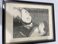 Front view of framed abstract ink drawing