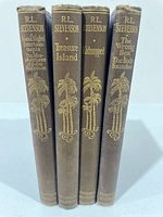 Four Stevenson Tusitala Edition spines showing titles