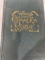 Front cover detail showing gilt title and embossing