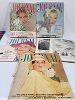 Front covers of five of the six Journal magazines