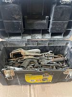 Toolbox closed showing exterior label and latches