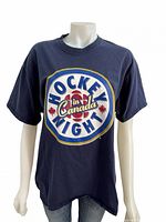 Front view of navy T-shirt showing large Hockey Night in Canada logo