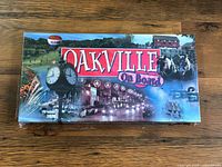 Front of sealed Oakville On Board game box