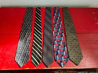 Front view of all five ties showing patterns and colours