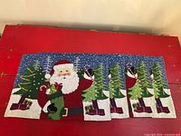 Full set of six placemats laid on red surface