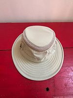 Top and front view of light khaki Tilley Airflo hat