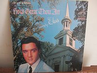 Front jacket showing album title, Elvis portrait, church artwork