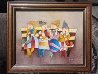 Full view of framed Joyce Roybal painting with four children musicians