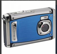 Front view showing blue brushed-metal panel, lens housing, and vertical Coleman badge