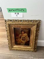 Full view of framed print against wall with size tape 15x17x1